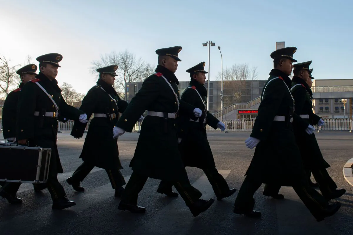 Paramilitary police officers march outside Beijing Railway Station before the arrival of North Korean leader Kim Jong Un in Beijing on Jan. 8, 2019. (Nicolas Asfouri/AFP via Getty Images)