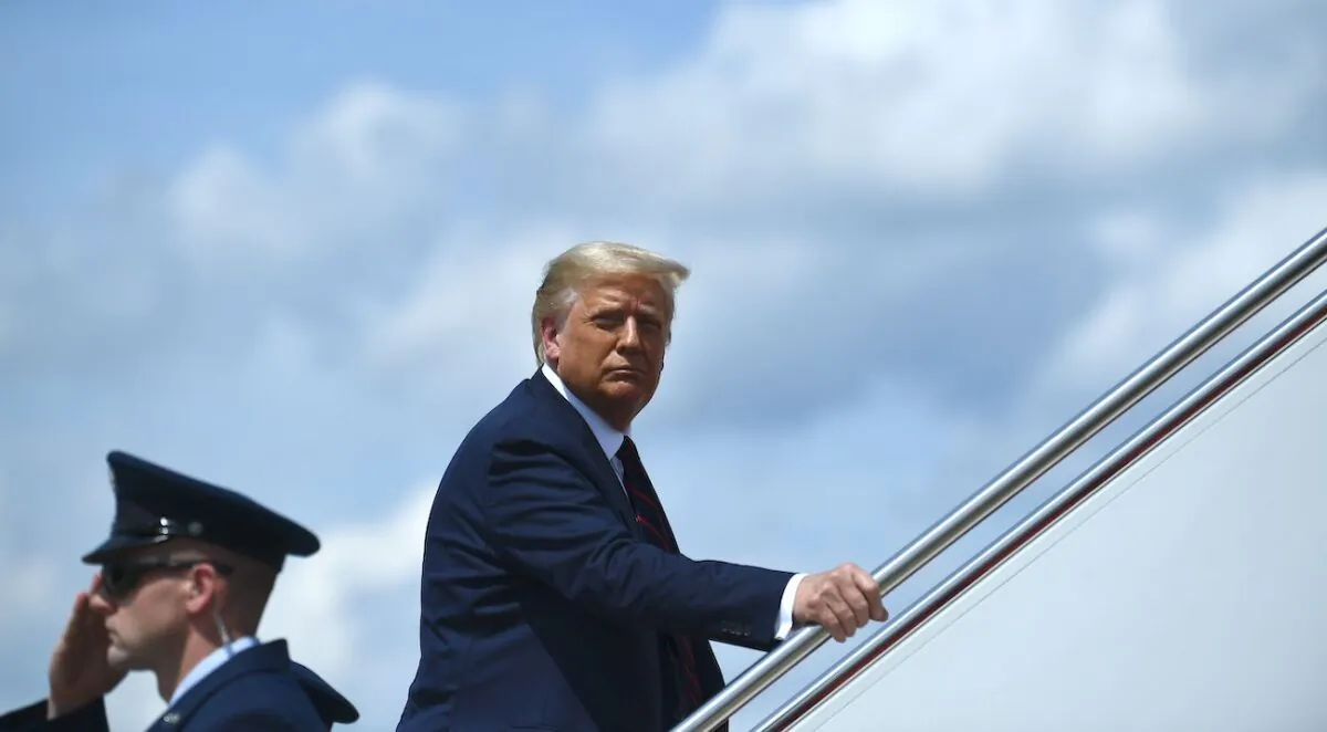 President Donald Trump boards Air Force One at Andrews Air Force Base in Maryland, on Aug. 20, 2020. (Brendan Smialowski/AFP via Getty Images)