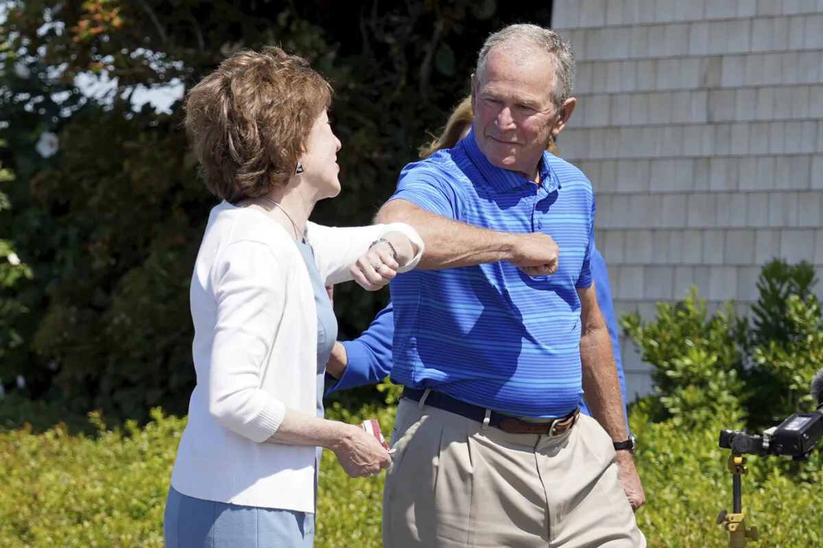 Sen. Susan Collins (R-Maine), left, and former President George W. Bush elbow bump in Kennebunkport, Maine, Aug. 21, 2020. (Mary Schwalm/AP Photo)