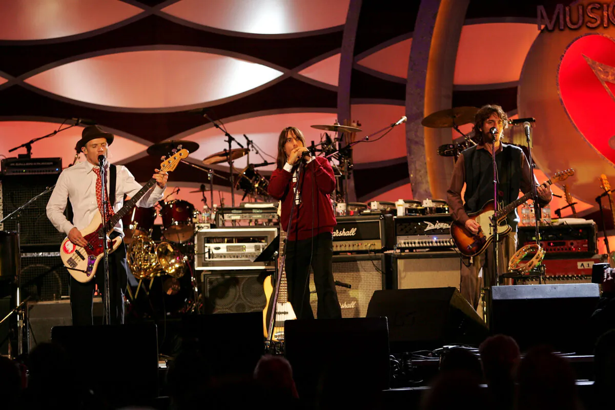 The Red Hot Chili Peppers perform onstage at the MusiCares 2005 Person of the Year Tribute to Brian Wilson at the Palladium in Hollywood, Calif., on Feb. 11, 2005. (Frank Micelotta/Getty Images)