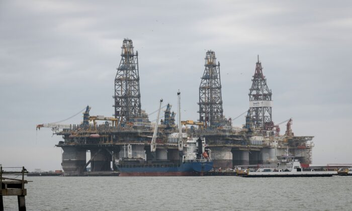 Defunct oil drilling rigs in the Corpus Christi Ship Channel at Aransas Pass in Port Aransas, Texas, on March 11, 2019. (Loren Elliott/AFP via Getty Images)
