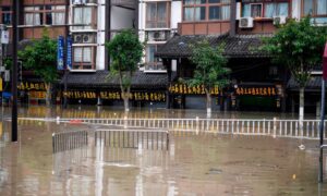 Petitioners in China’s Chongqing Claim Detentions, Beatings as Premier Visits Flooded Village