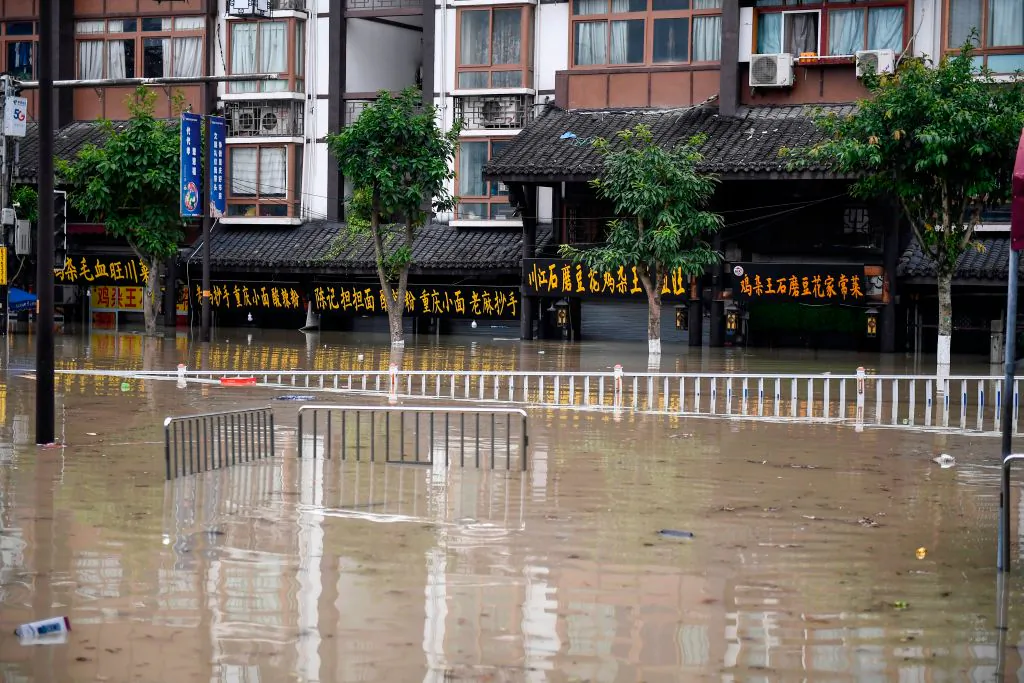 A flooded street in Chongqing, a city located in southwestern China, on Aug. 19, 2020. (STR/AFP via Getty Images)