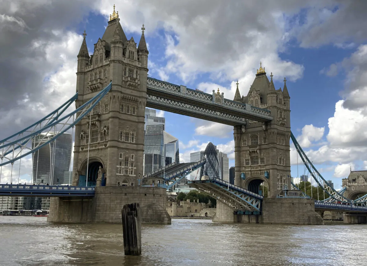 Tower Bridge is stuck open, leaving traffic in chaos, on Aug. 22, 2020. The historic bridge has failed to close Saturday after opening to allow ships to pass underneath on the River Thames. (Tony Hicks/AP Photo)