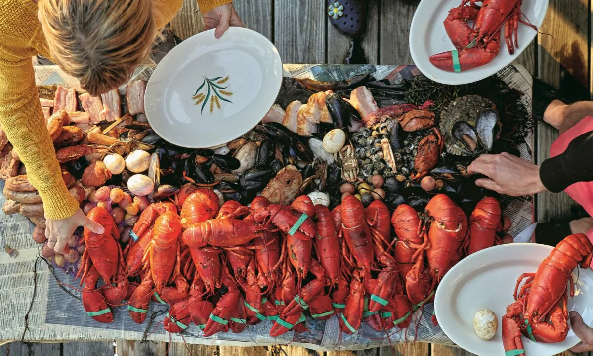 A clambake should be ‘casual, familial, and abundant, focusing on the beauty of nature and breaking bread with loved ones,’ write the authors of the ‘Eventide’ cookbook. (Zack Bowen)