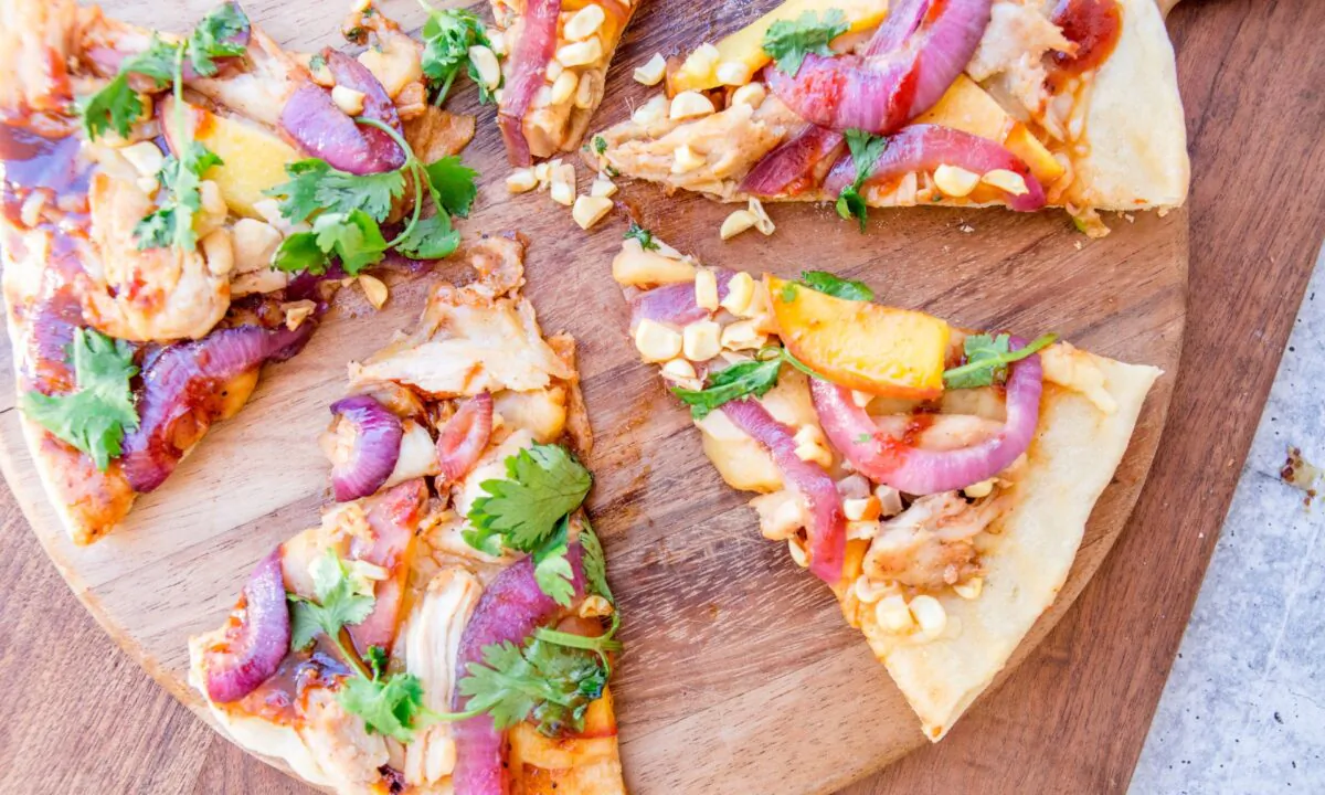 Sweet and tangy barbecue sauce, perfectly cooked chicken, charred corn and red onion, and melty, gooey cheese—it works. (Caroline Chambers)