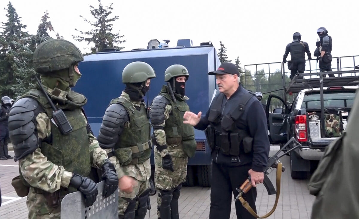 Alexander Lukashenko greets riot police officers