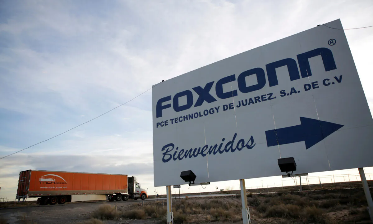 A sign announces the manufacturing complex of Foxconn PCE Technology, in Ciudad Juarez, Mexico, on Feb. 6, 2020. (Jose Luis Gonzalez/File Photo/Reuters)