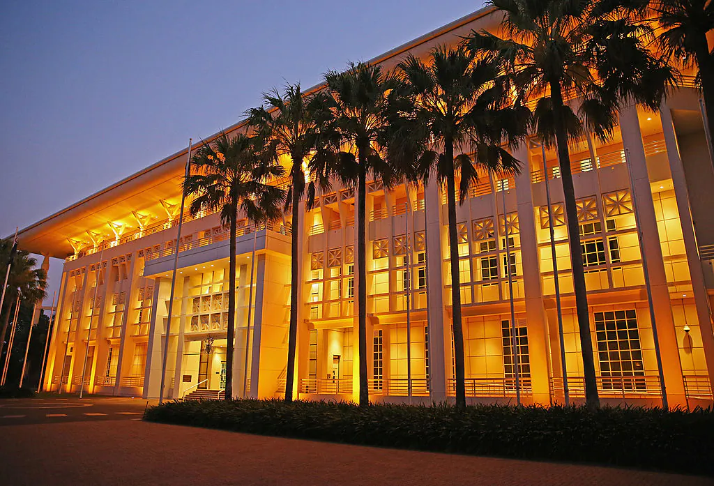 Parliament House is lit up at dusk in State Square on October 6, 2013 in Darwin, Australia. (Scott Barbour/Getty Images)