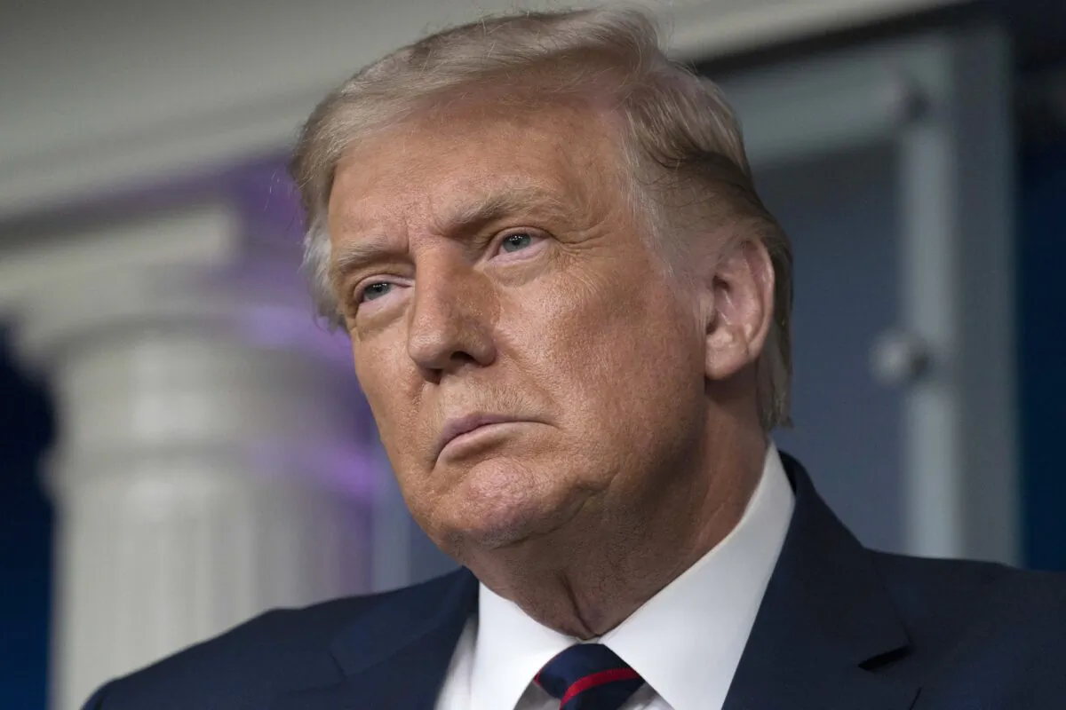 President Donald Trump pauses while speaking during a media briefing in the James Brady Briefing Room of the White House in Washington on Aug. 23, 2020. (Alex Brandon/AP Photo)