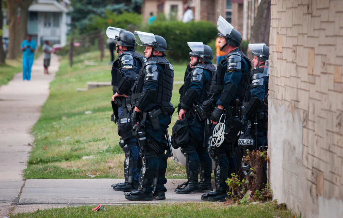 Police in riot gear in Milwaukee, Wisconsin, on Aug. 15, 2016. (Darren Hauck/Getty Images)
