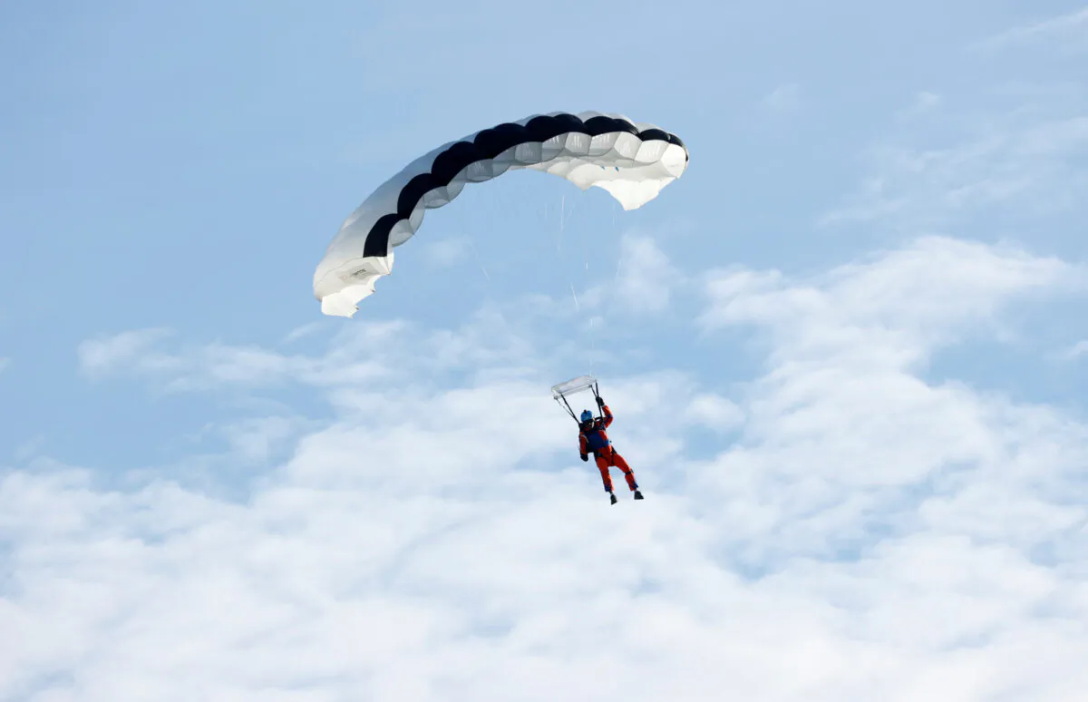 Project instigator Raphael Domjan jumps with a parachute from the SolarStratos aircraft, a solar-powered two-seater aircraft, in Payerne, Switzerland, on Aug. 25, 2020. (Denis Balibouse via Reuters)