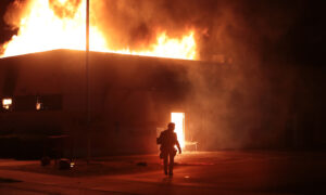 Rioters Torch Kenosha as New Video Shows Scuffle Between Officers, Shooting Victim