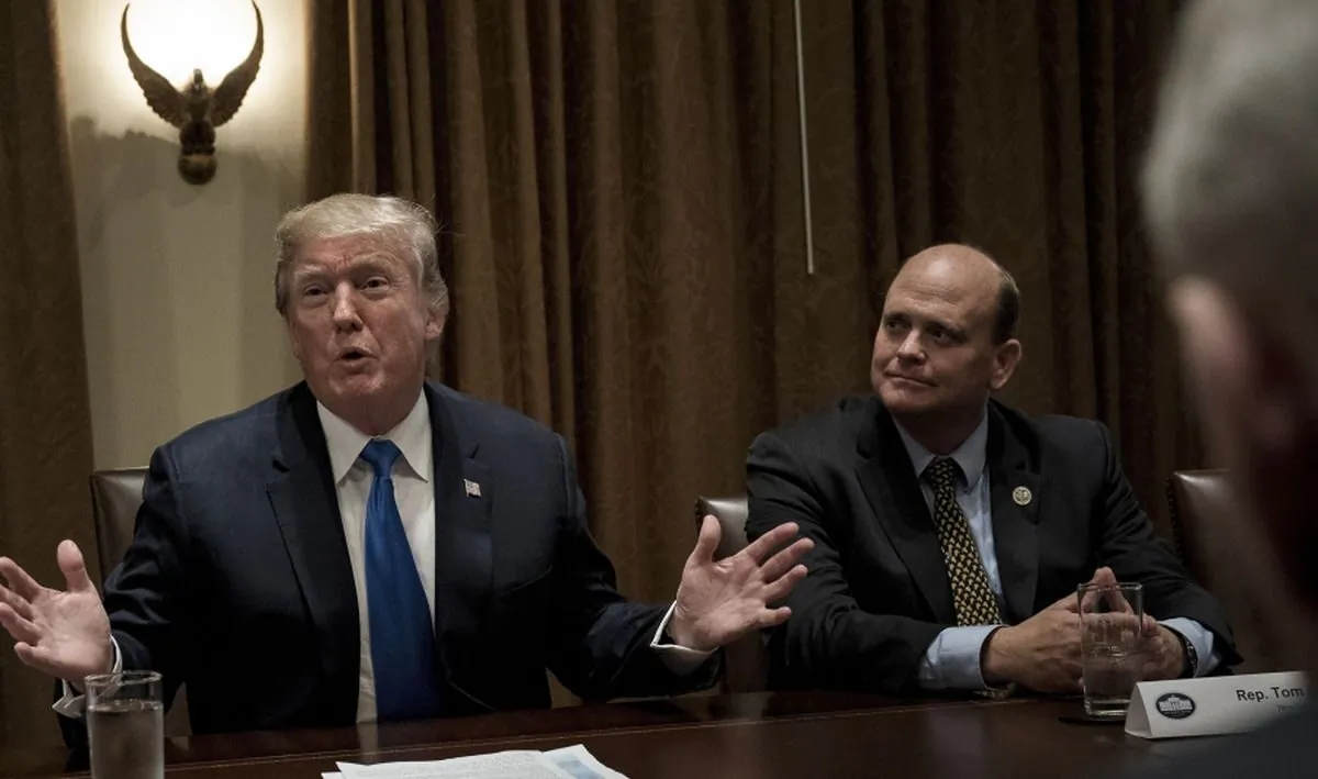 Rep. Tom Reed (R-N.Y.) (R) listens while U.S. President Donald Trump addresses a meeting with lawmakers in the Cabinet Room of the White House on Sept. 13, 2017. (Brendan Smialowski/AFP via Getty Images)