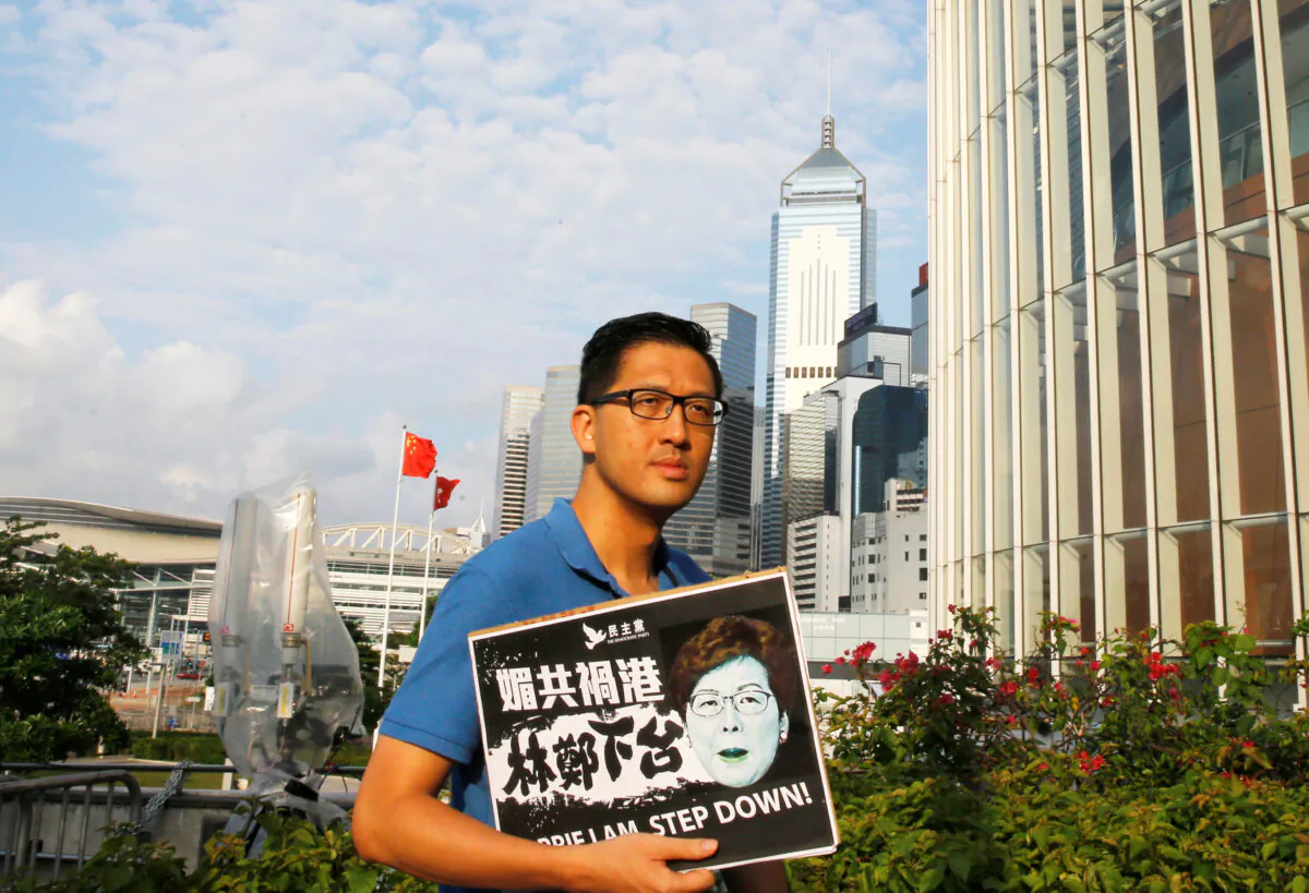 Member of Hong Kong's Democratic Party Lam Cheuk-ting arrives at a news conference in response to the announcement by Hong Kong Chief Executive Carrie Lam regarding the proposed extradition bill, outside the Legislative Council building in Hong Kong, China, on June 15, 2019. (Thomas Peter via Reuters)