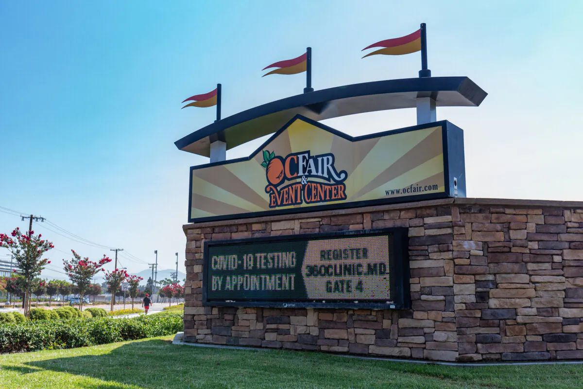 A sign at the Orange County Fair & Event Center welcomes visitors to a new COVID-19 testing supersite in Costa Mesa, Calif., on Aug. 26, 2020. (John Fredricks/The Epoch Times)