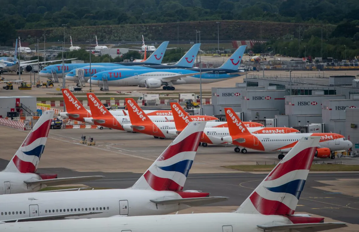 British Airlines, EasyJet, and TUI aircraft at London Gatwick Airport on June 9, 2020. (Chris J Ratcliffe/Getty Images)