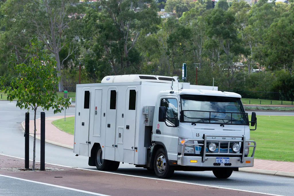 A prison van believed to be transporting former West Coast Eagles AFL player Ben Cousins leaves the Armadale Magistrates Court in Perth on Thursday, April 23, 2020. (Getty image/