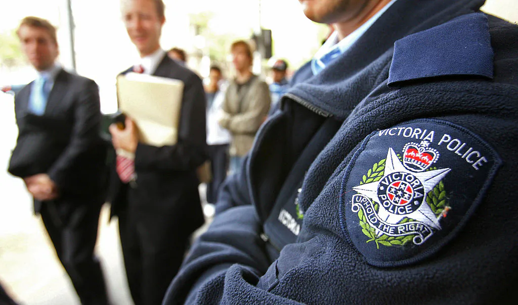 Victorian police maintain a heavy presence outside the Melbourne Magistrates Court on April 3, 2006. (William West/AFP via Getty Images)