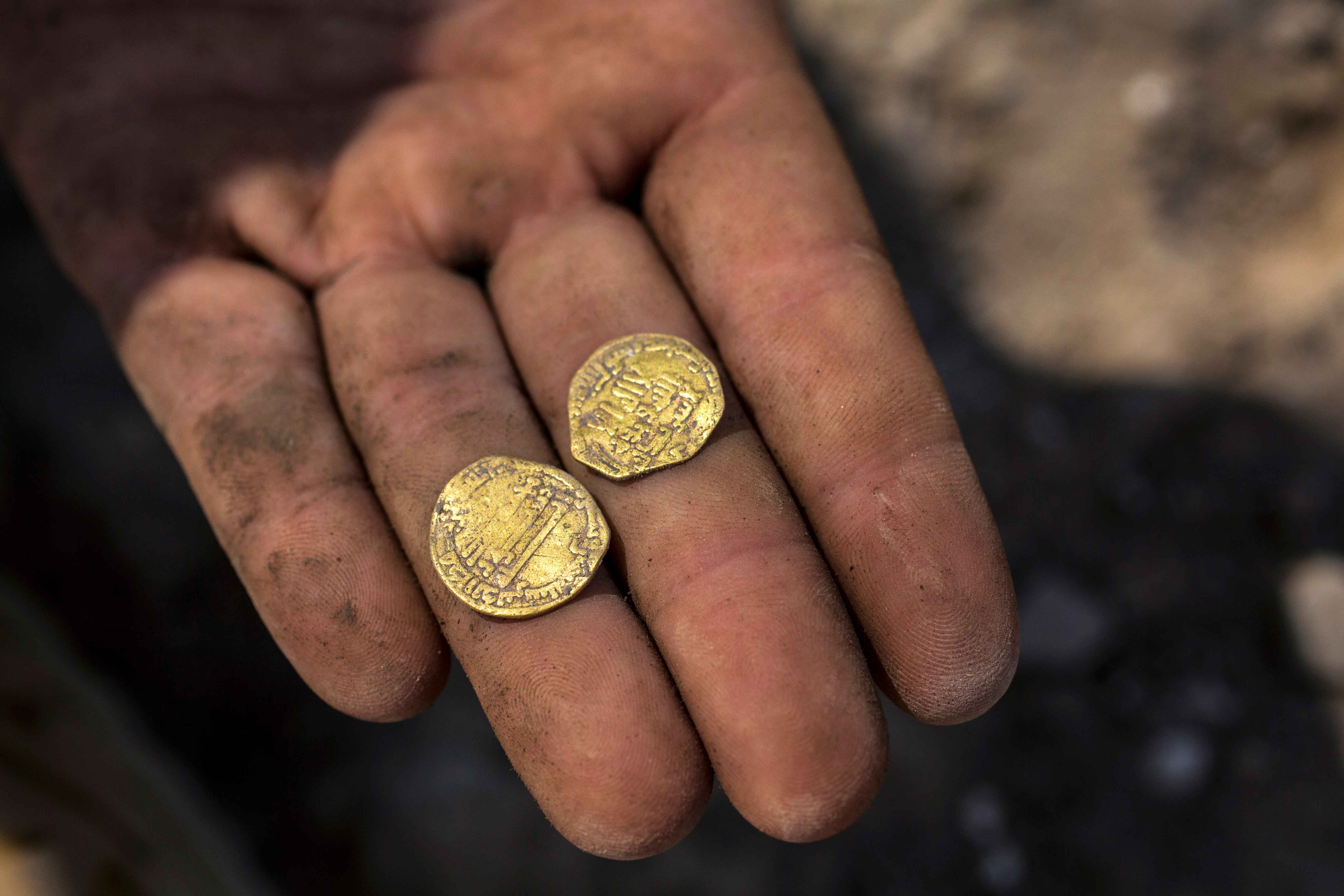 Teenagers Unearth Trove of 1 000 Year Old Gold Coins in Clay