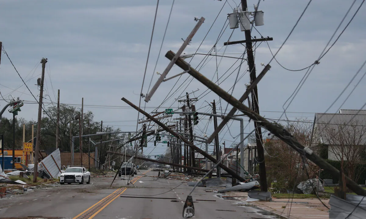A street is seen strewn with debris and downed power lines after Hurricane Laura passed through the area in Lake Charles, La., on August 27, 2020. (Photo by Joe Raedle/Getty Images)