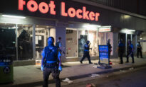 Minneapolis Under Curfew, State of Emergency After Looting and Unrest