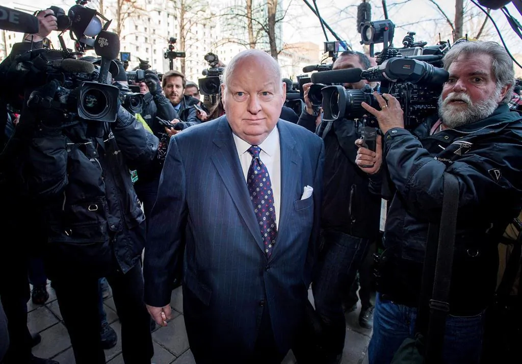 Suspended senator Mike Duffy arrives for his first court appearance at the courthouse in Ottawa on April 7, 2015. (The Canadian Press/Justin Tang)