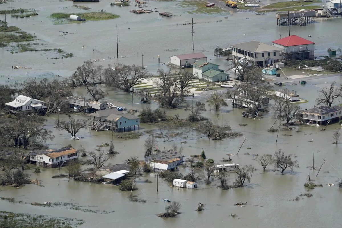 Buildings and homes are flooded in the aftermath of Hurricane Laura on Aug. 27, 2020, near Lake Charles, La. (AP Photo/David J. Phillip)