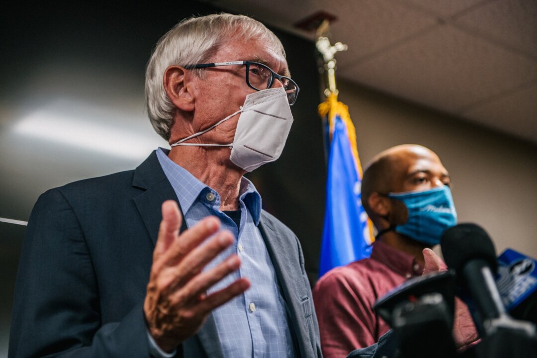 Wisconsin Gov. Tony Evers (L) and Lt. Gov. Mandela Barnes speak to reporters in Kenosha, Wis., on Aug. 27, 2020. (Brandon Bell/Getty Images)