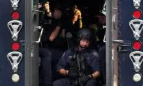 Gunman Who Shot 2 Officers Arrested After 12-hour Standoff
