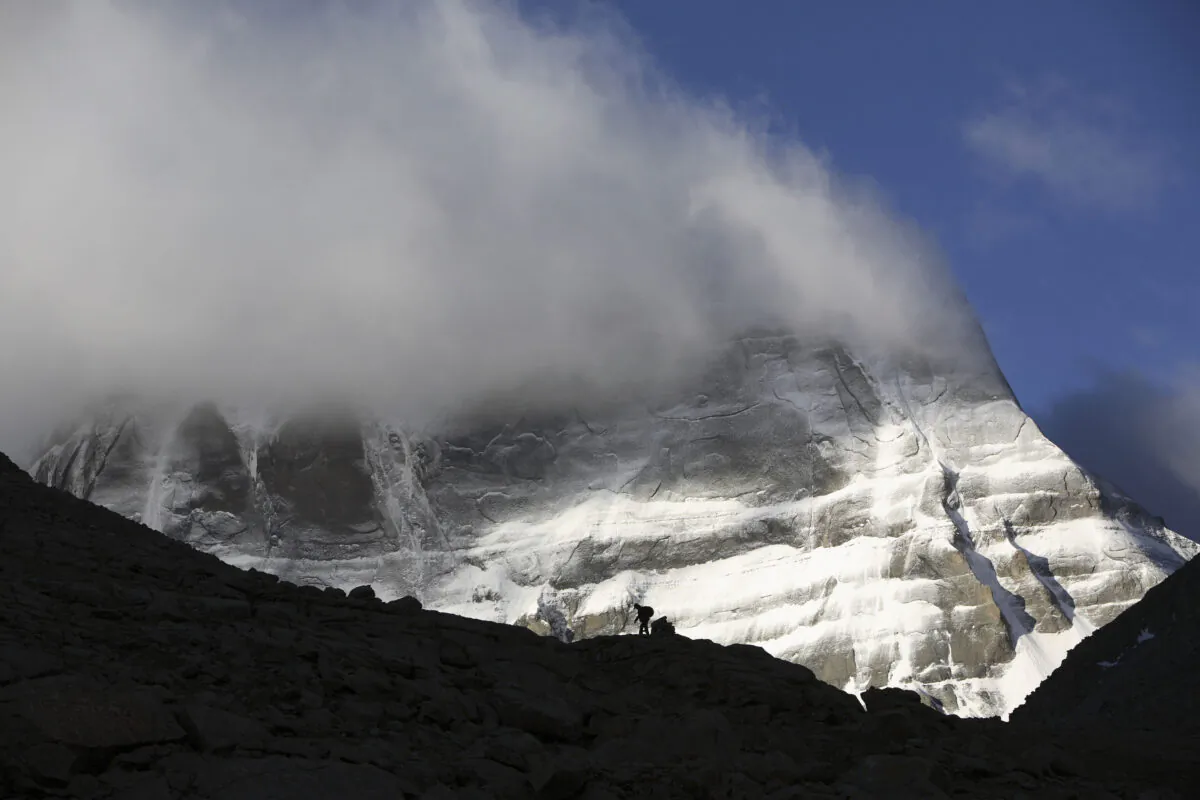 The snow-capped Kangrinboqe Mountain, known as Mt. Kailash in the West, is shown June 16, 2007 in Purang County of Tibet Autonomous Region, China. Kangrinboqe, meaning  holy Mountain in Tibetan, is the summit of Gangdise Mountains with an altitude around 6,638 meters (21,778 feet) above sea-level. (China Photos/Getty Images)