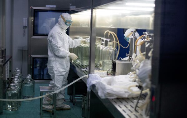 A researcher working in a lab at the Yisheng Biopharma, a company that develops COVID-19 vaccines, in Shenyang, China, on June 10, 2020. (NOEL CELIS/AFP via Getty Images)