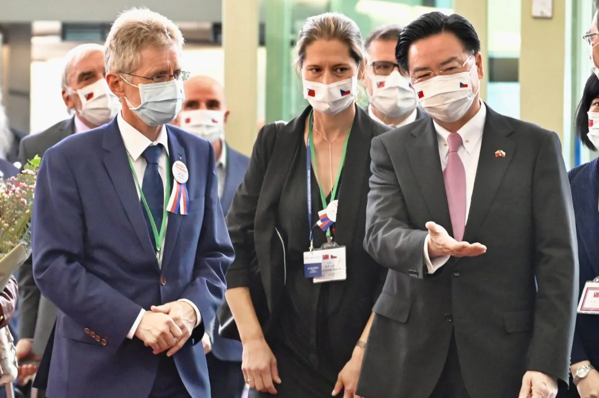 Czech Senate President Milos Vystrcil (L) is greeted by Taiwan's Foreign Minister Joseph Wu (R) upon his arrival at the Taoyuan airport in Taiwan on Aug. 30, 2020. (SAM YEH/AFP via Getty Images)
