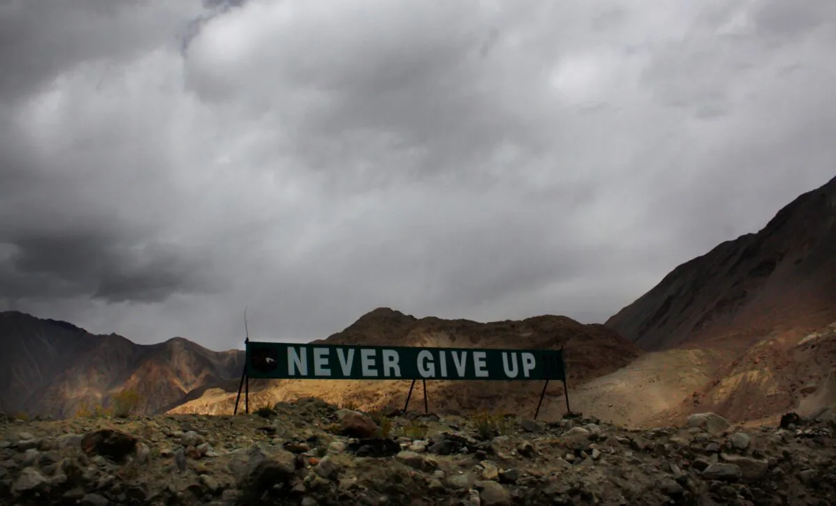 A banner erected by the Indian army stands near Pangong Tso lake near the India–China border in India's Ladakh area on Sept. 14, 2017. (Manish Swarup/AP Photo)