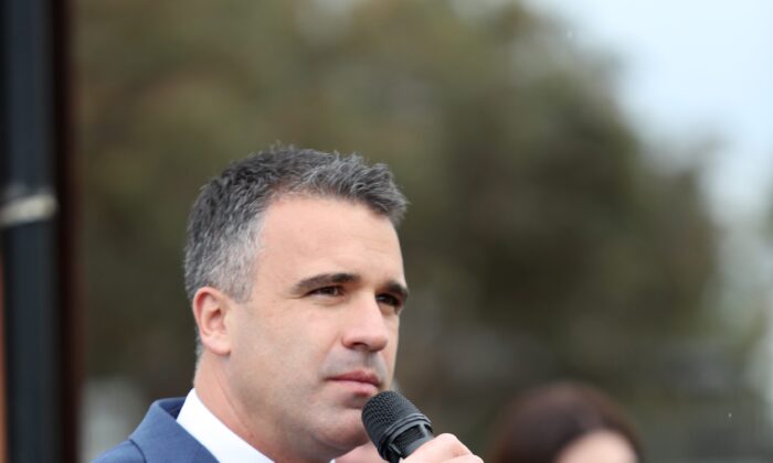 South Australian Labor Leader Peter Malinauskas speaks to Australian Submarine Corporation workers during a lunch time rally about the future of 700 submarine maintenance jobs at ASC in Adelaide, Monday, September 2, 2019. (AAP Image/Kelly Barnes) 