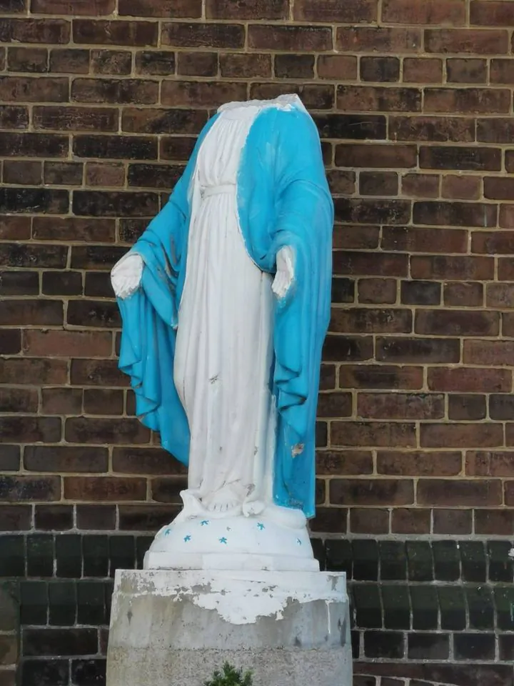 A headless statue of the Virgin Mary is seen outside the Our Lady of Lebanon church in Parkdale, Toronto, on Aug. 30, 2020. (Facebook)