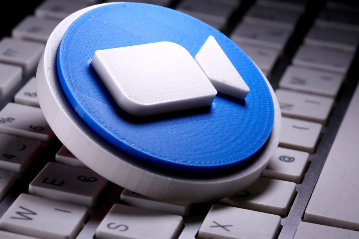 A 3D printed Zoom logo is placed on the keyboard in this illustration taken April 12, 2020. (Dado Ruvic/Reuters)