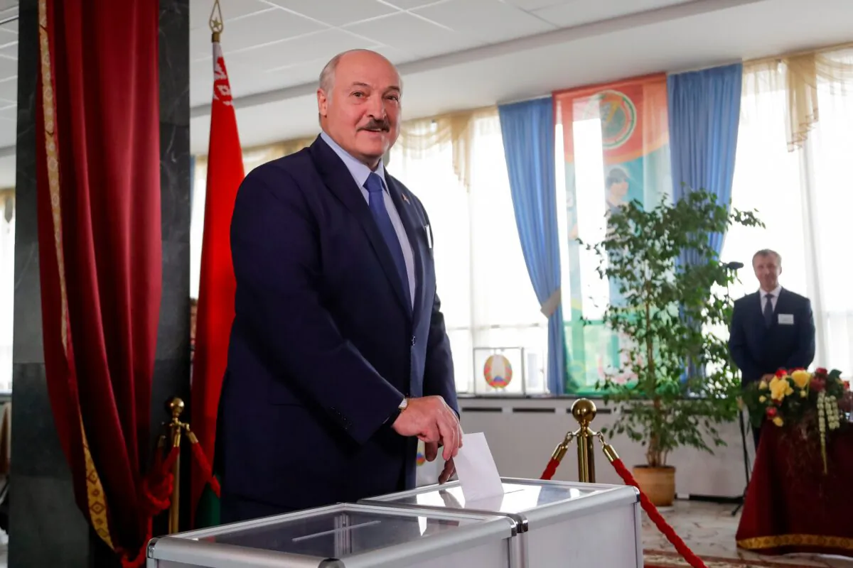 Belarusian President Alexander Lukashenko casts his ballot at a polling station during the election in Minsk, Belarus, on Aug. 9, 2020. (Sergei Grits/AP Photo)