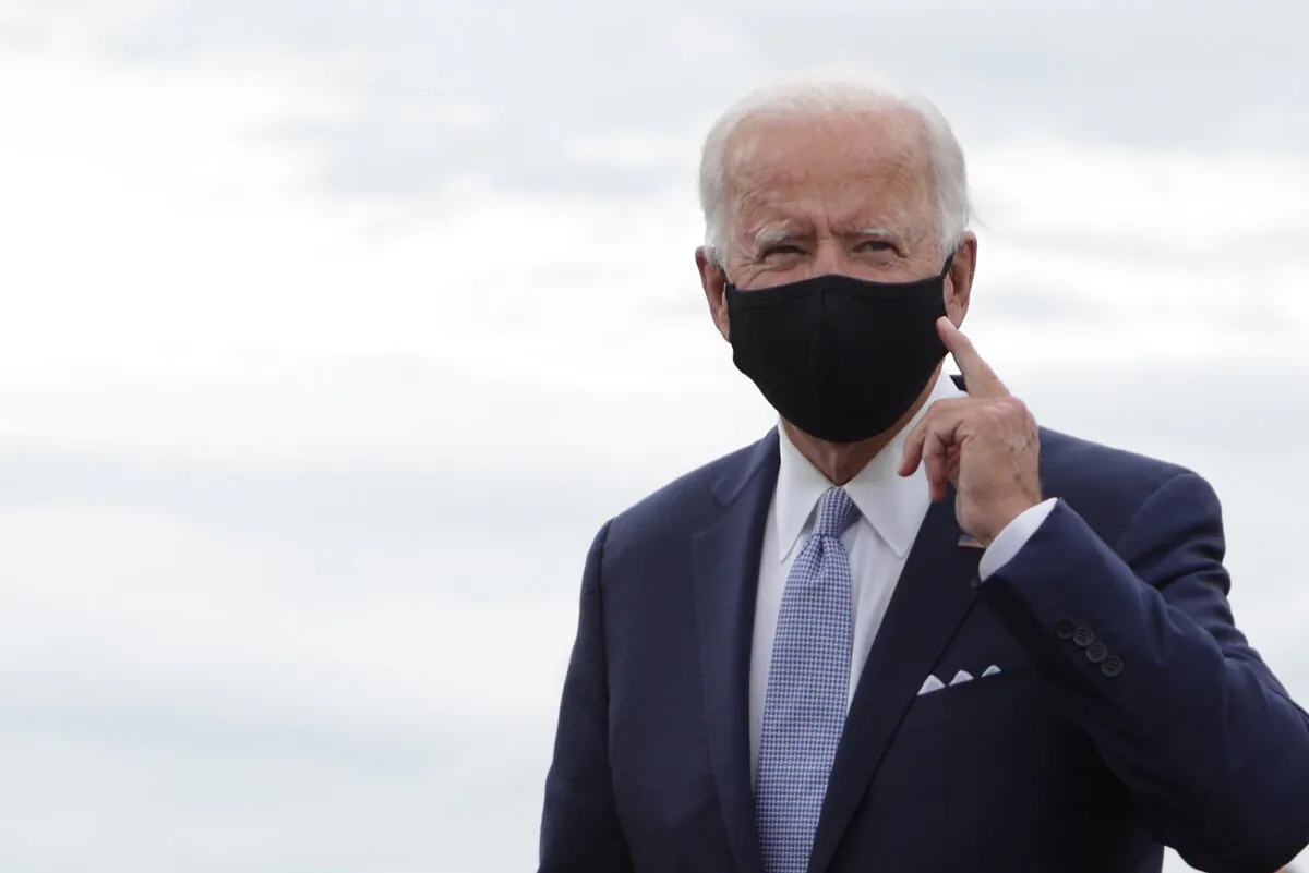 Democratic presidential nominee former Vice President Joe Biden gestures after landing at Allegheny County Airport in West Mifflin, Penn., on Aug. 31, 2020. (Alex Wong/Getty Images)