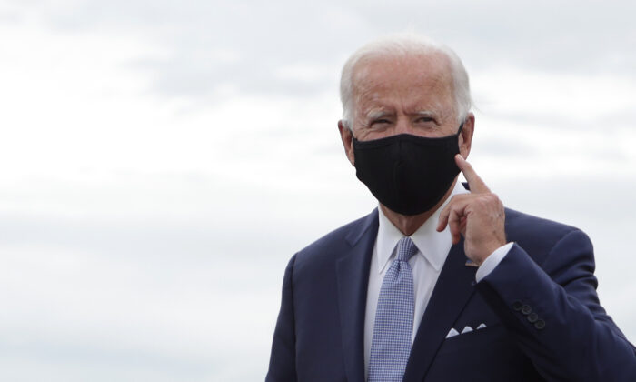 Democratic presidential nominee former Vice President Joe Biden gestures after landing at Allegheny County Airport in West Mifflin, Penn., on Aug. 31, 2020. (Alex Wong/Getty Images)