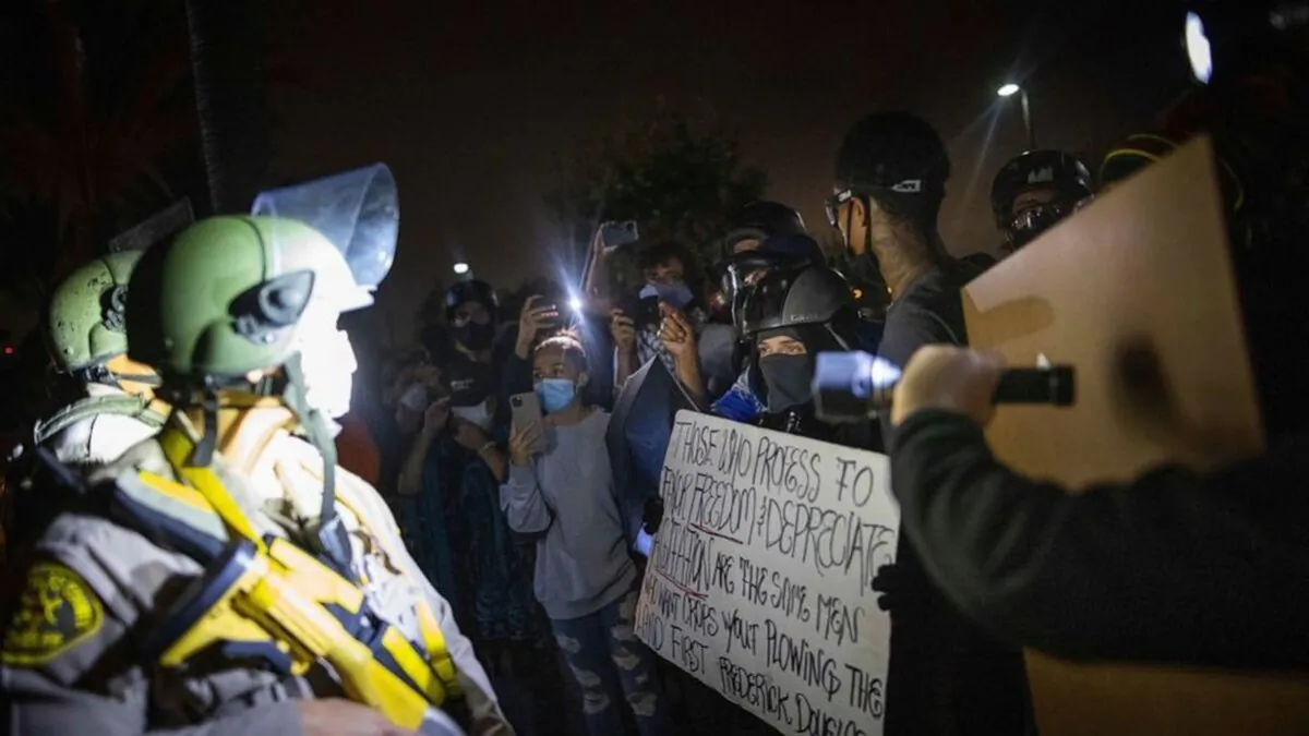 Protesters clash with deputies of the Los Angeles Sheriff's Department during protests following the death of Dijon Kizzee on Monday, Aug. 31, 2020, in Los Angeles, Calif. (Christian Monterrosa/AP Photo)
