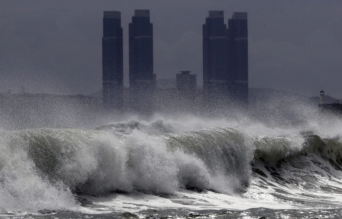High waves crash onto Haeundae Beach in Busan, South Korea, on Aug. 26, 2020. (Jo Jong-ho/Yonhap via AP)