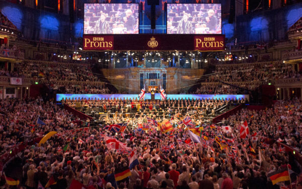 Revellers waving British flags as they enjoy 'The Last Night of the Proms' celebration in Hyde Park, in London on Sept. 14, 2018