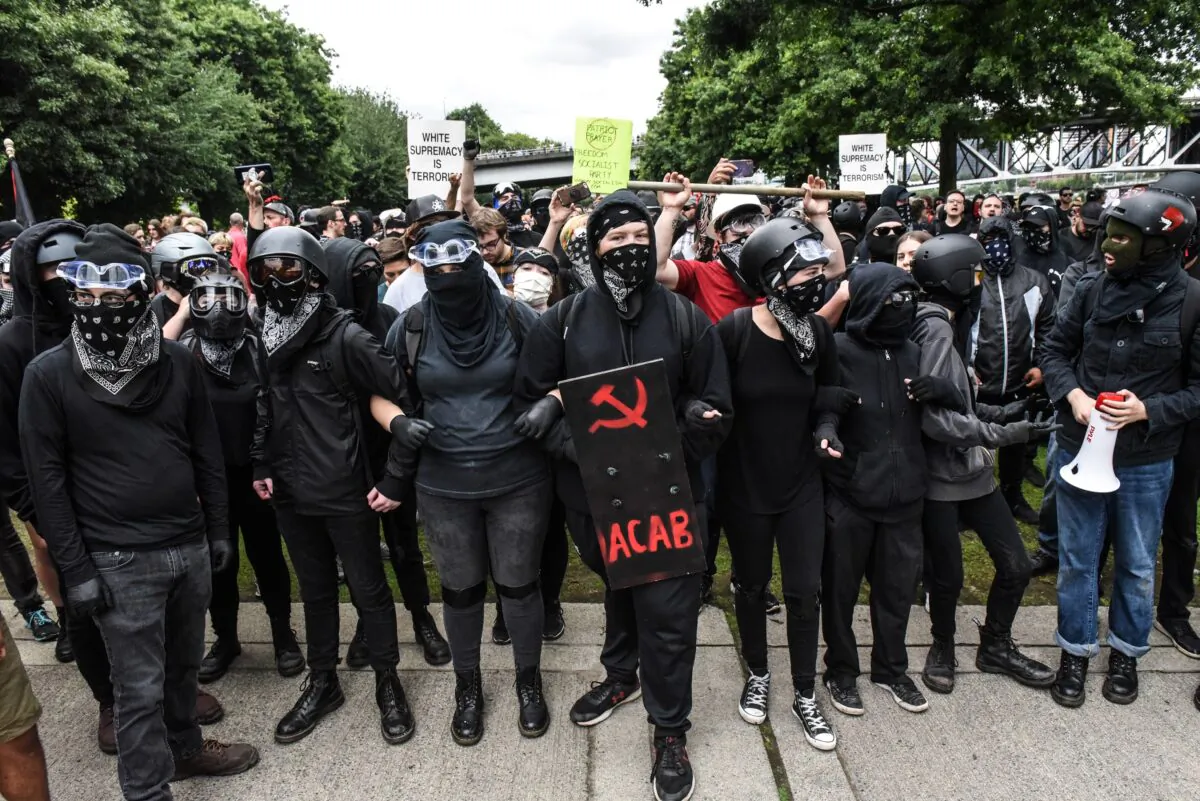 Antifa members line up to challenge a rally in Portland, Ore., Aug. 17, 2019. (Stephanie Keith/Getty Images)