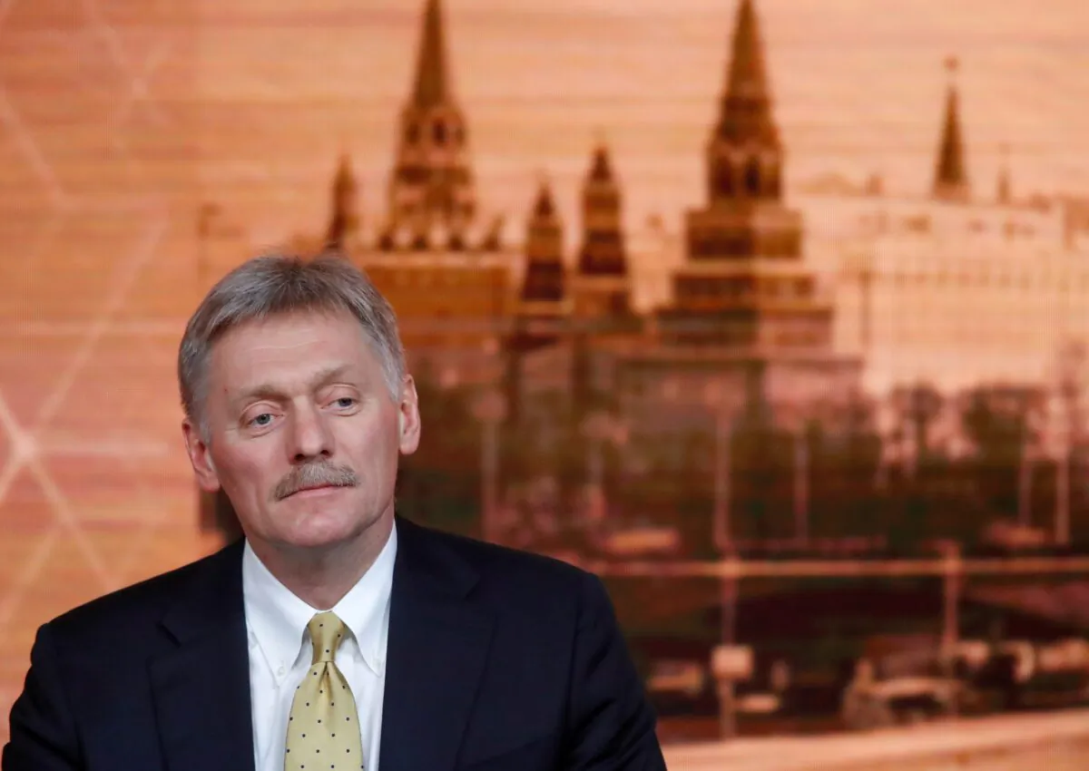 Kremlin spokesman Dmitry Peskov listens during Russian President Vladimir Putin's annual end-of-year press conference in Moscow on Dec. 19, 2019. (Evgenia Novozhenina/Reuters)