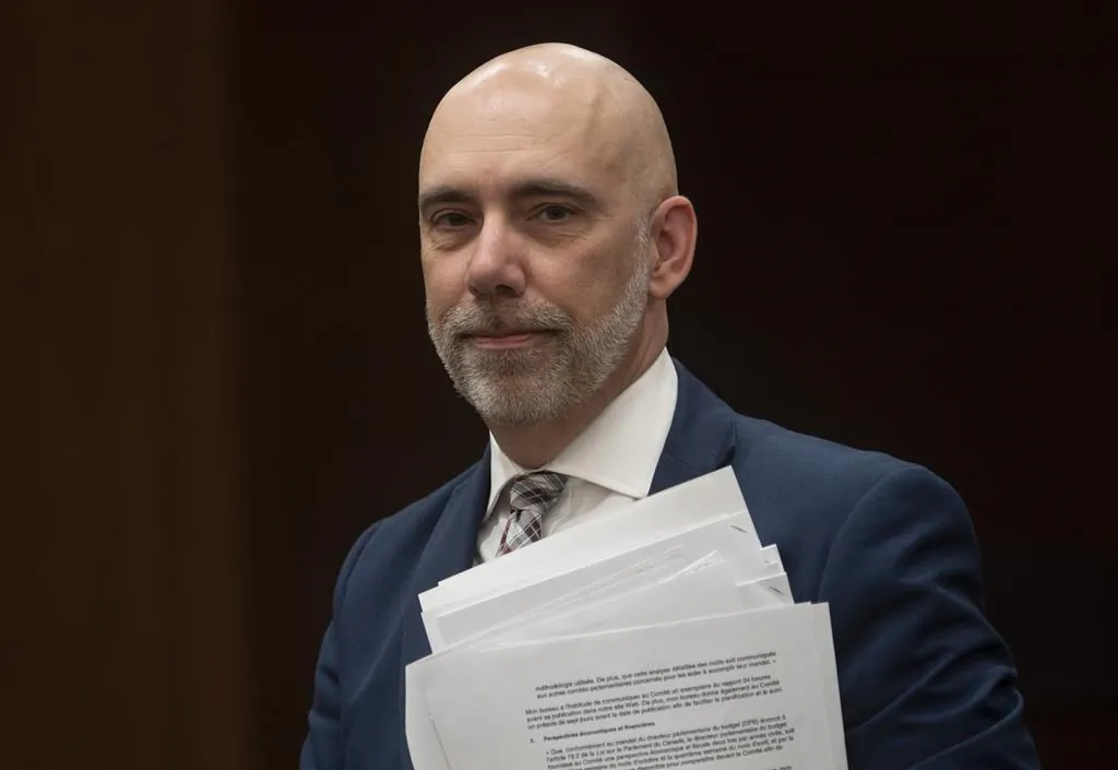 Parliamentary Budget Officer Yves Giroux waits to appear before the Commons Finance committee on Parliament Hill in Ottawa, on March 10, 2020. (The Canadian Press/Adrian Wyld)