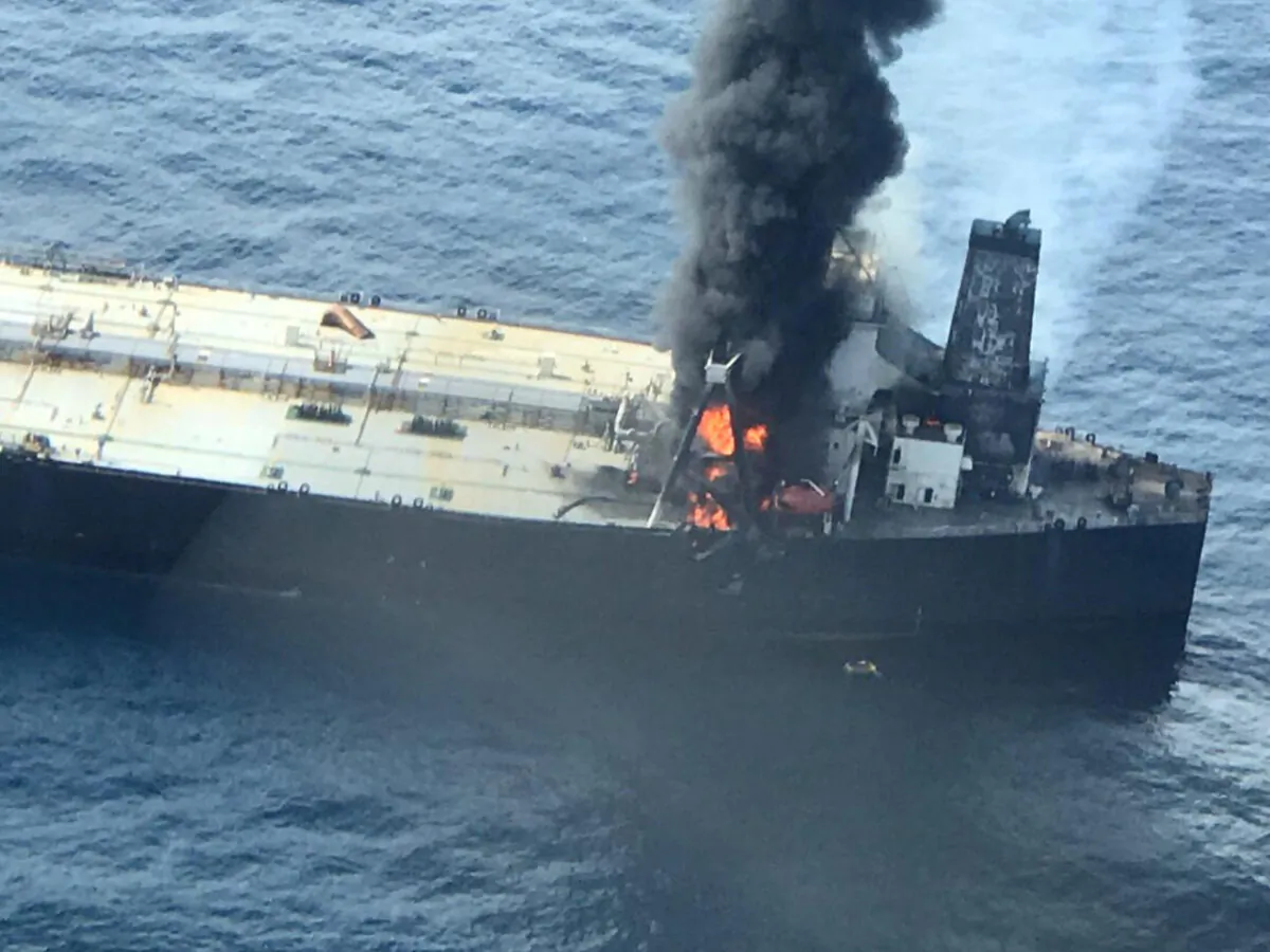 The New Diamond, a very large crude carrier, chartered by Indian Oil Corp, that was carrying the equivalent of about 2 million barrels of oil, is seen after a fire broke out off east coast of Sri Lanka, on Sept. 3, 2020. (Courtesy Sri Lankan Airforce media/Handout via Reuters)