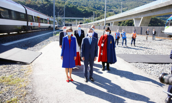 Swiss President Simonetta Sommaruga and Swiss Foreign Minister Ignazio Cassis arrive before the opening ceremony