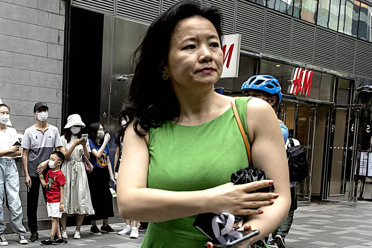Cheng Lei, a Chinese-born Australian journalist for CGTN, the English-language channel of China Central Television, attends a public event in Beijing on Aug. 12, 2020. (Ng Han Guan/AP Photo)