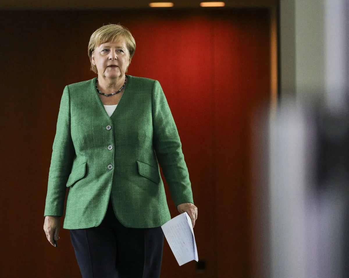 German Chancellor Angela Merkel arrives at a press conference following a virtual meeting with governors of Germany's 16 states at the Chancellery during the coronavirus pandemic in Berlin, Germany on Aug. 27, 2020. (Omer Messinger-Pool/Getty Images)